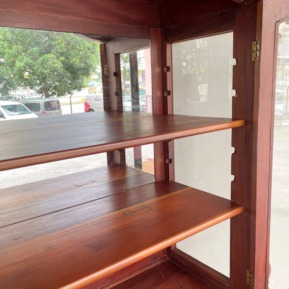 Ornate Wooden Display Cabinet with Cabriole Legs