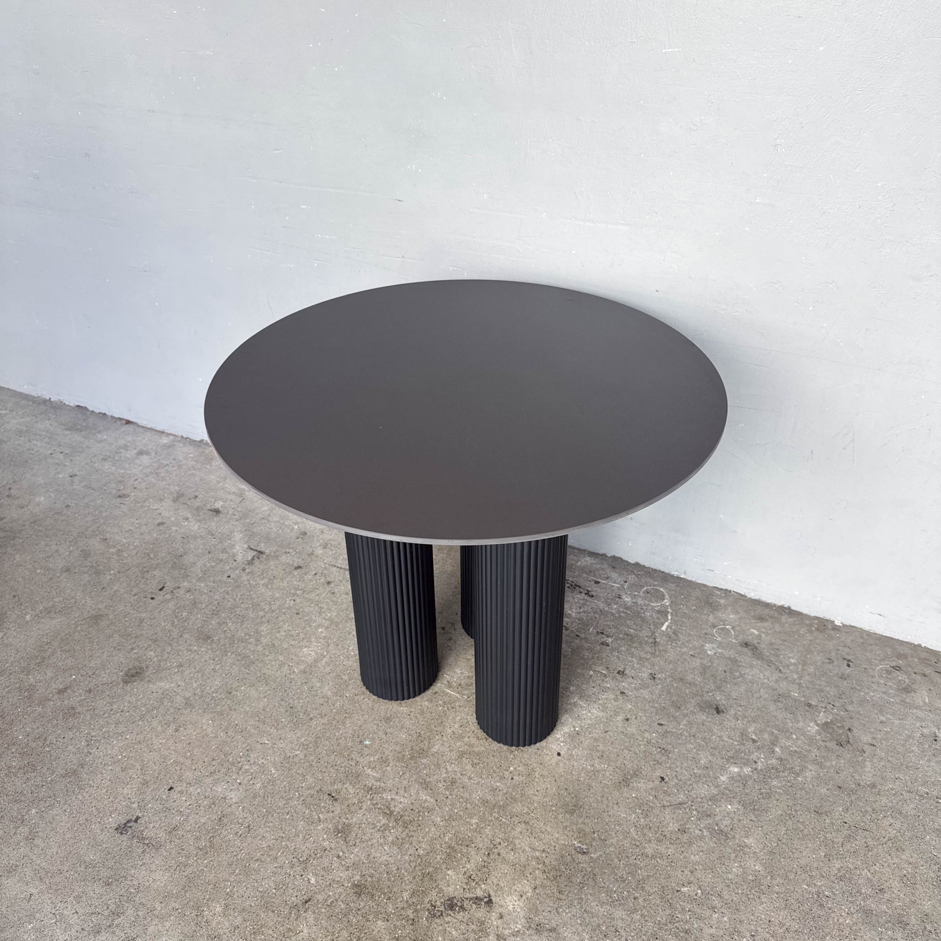 Ribbed Black Pedestal Round Table