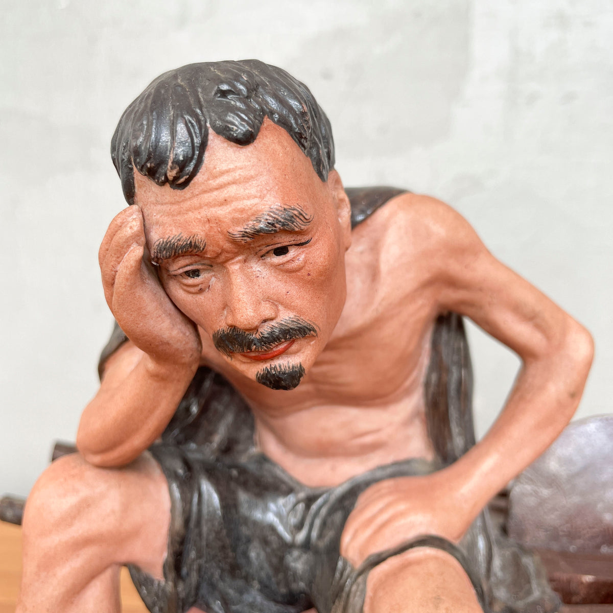 Resting Labourer with Wheelbarrow Ceramic Figurine