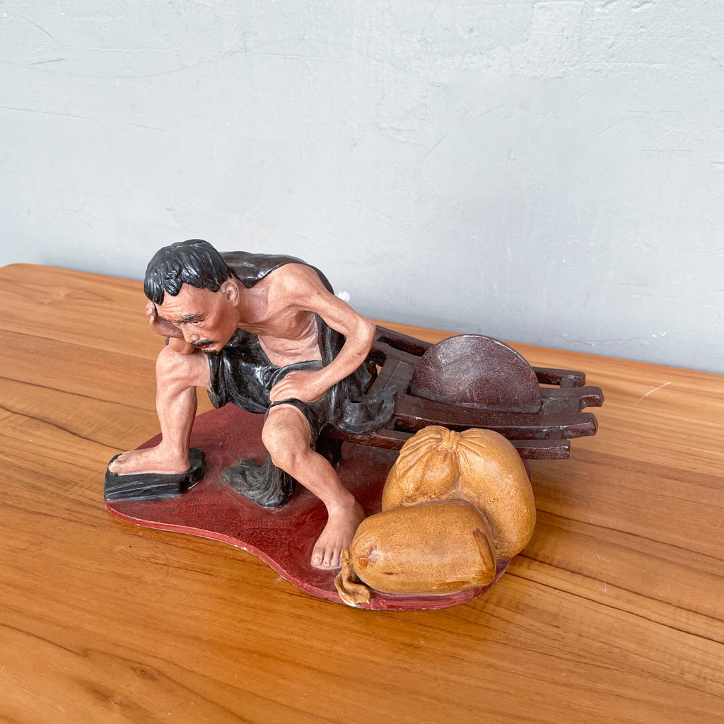 Resting Labourer with Wheelbarrow Ceramic Figurine