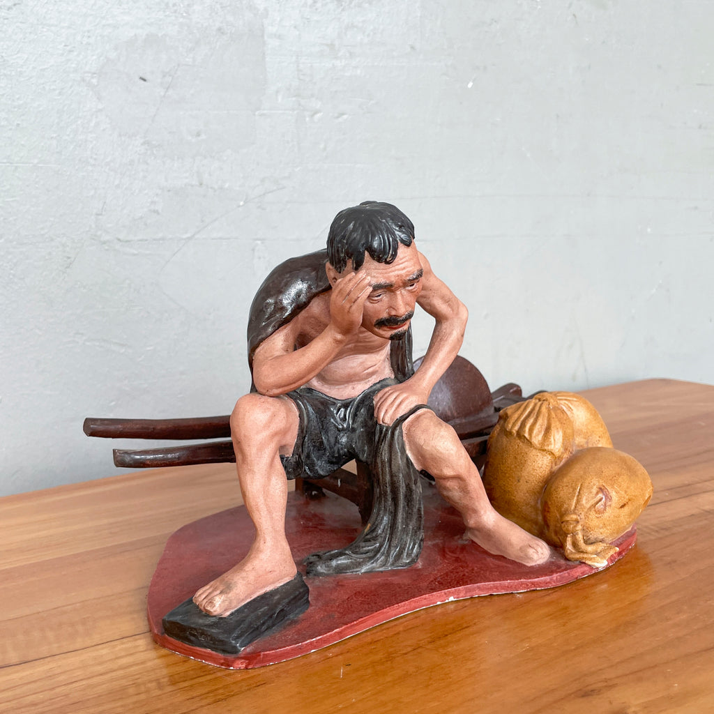 Resting Labourer with Wheelbarrow Ceramic Figurine