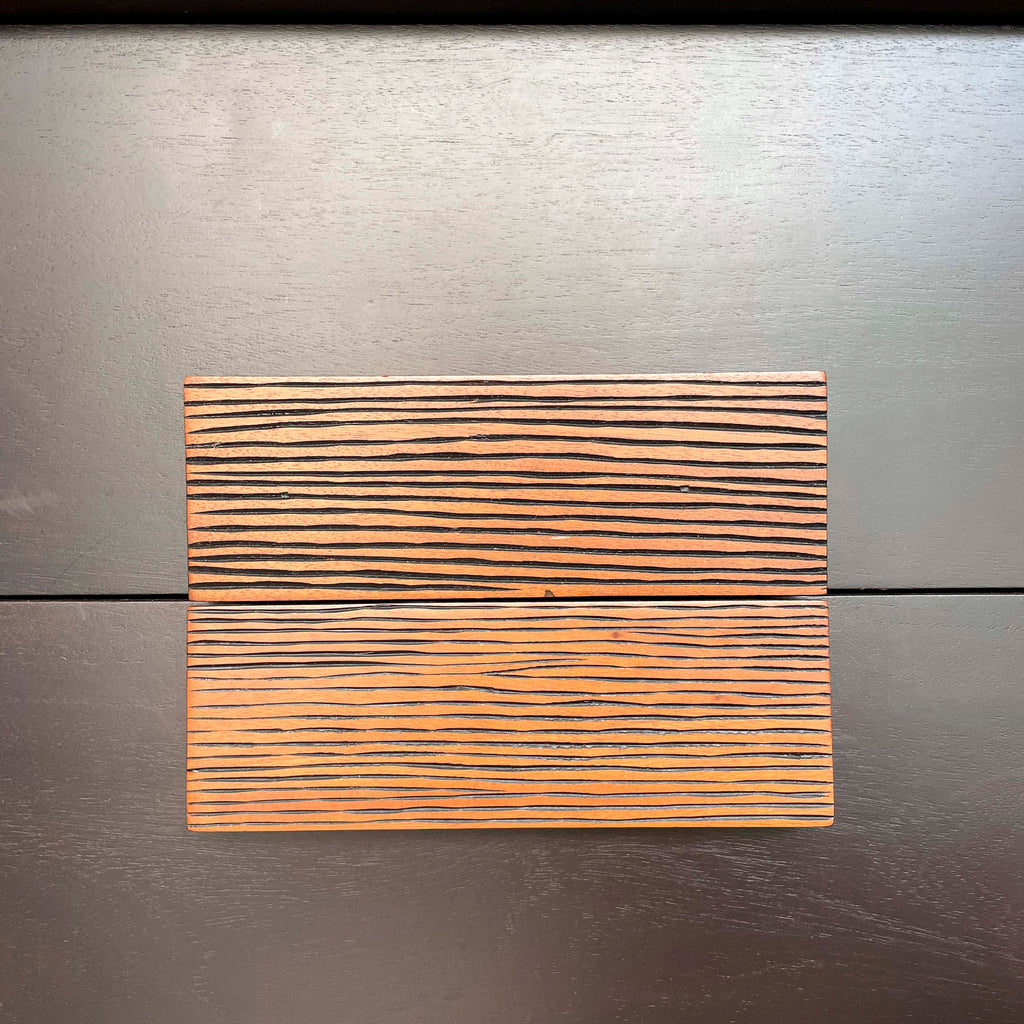 Dark-Stained Chest of Drawers with Ribbed Accents