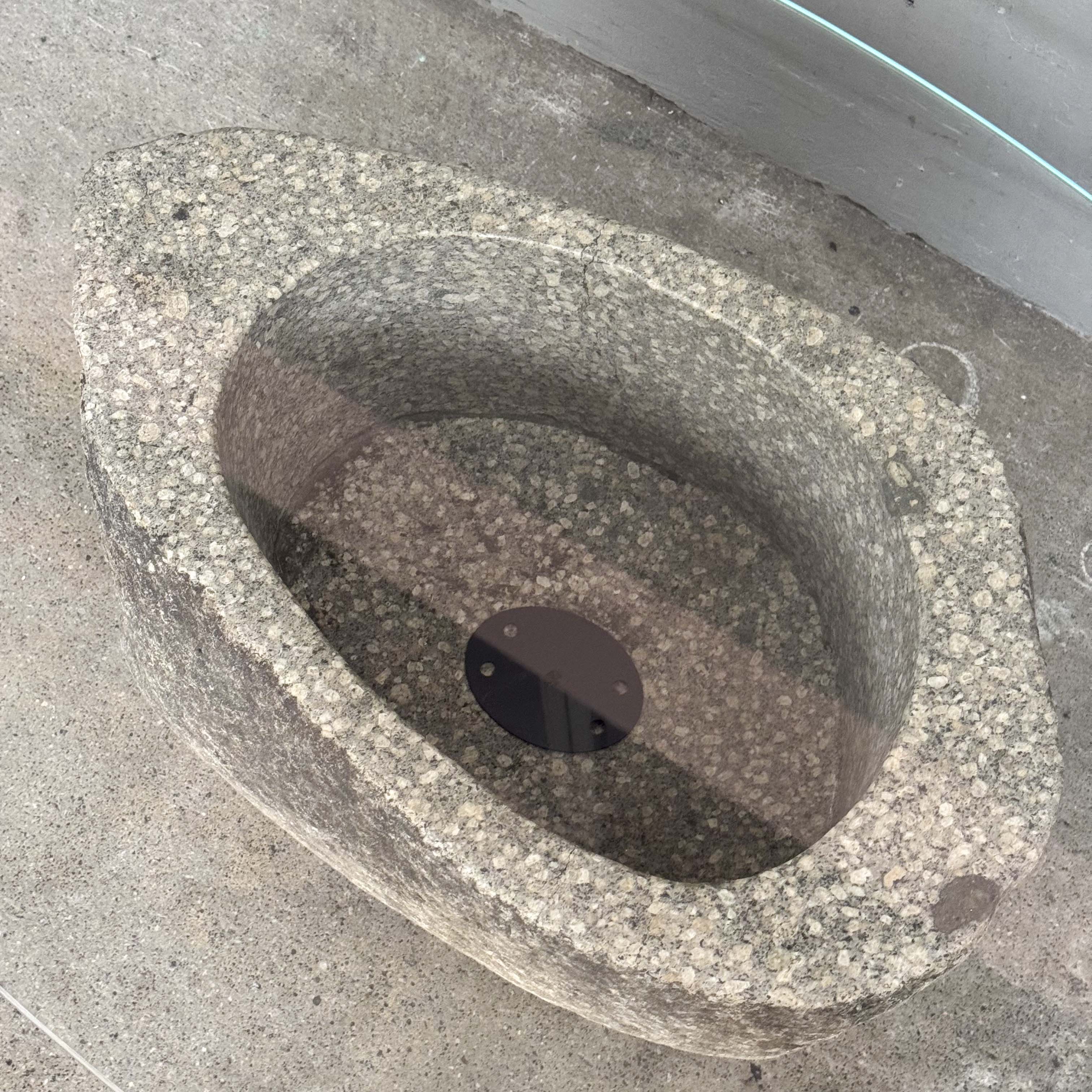 Oval Glass Coffee Table with Stone Base