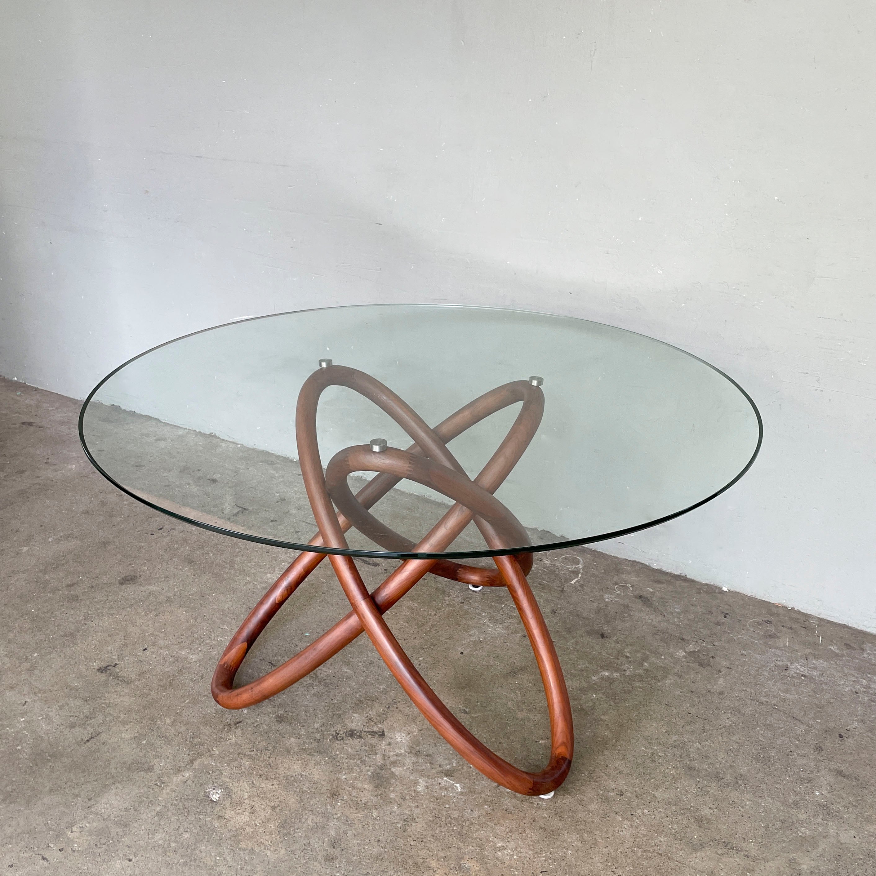 Glass Top Dining Table with Interlocking Ring Base